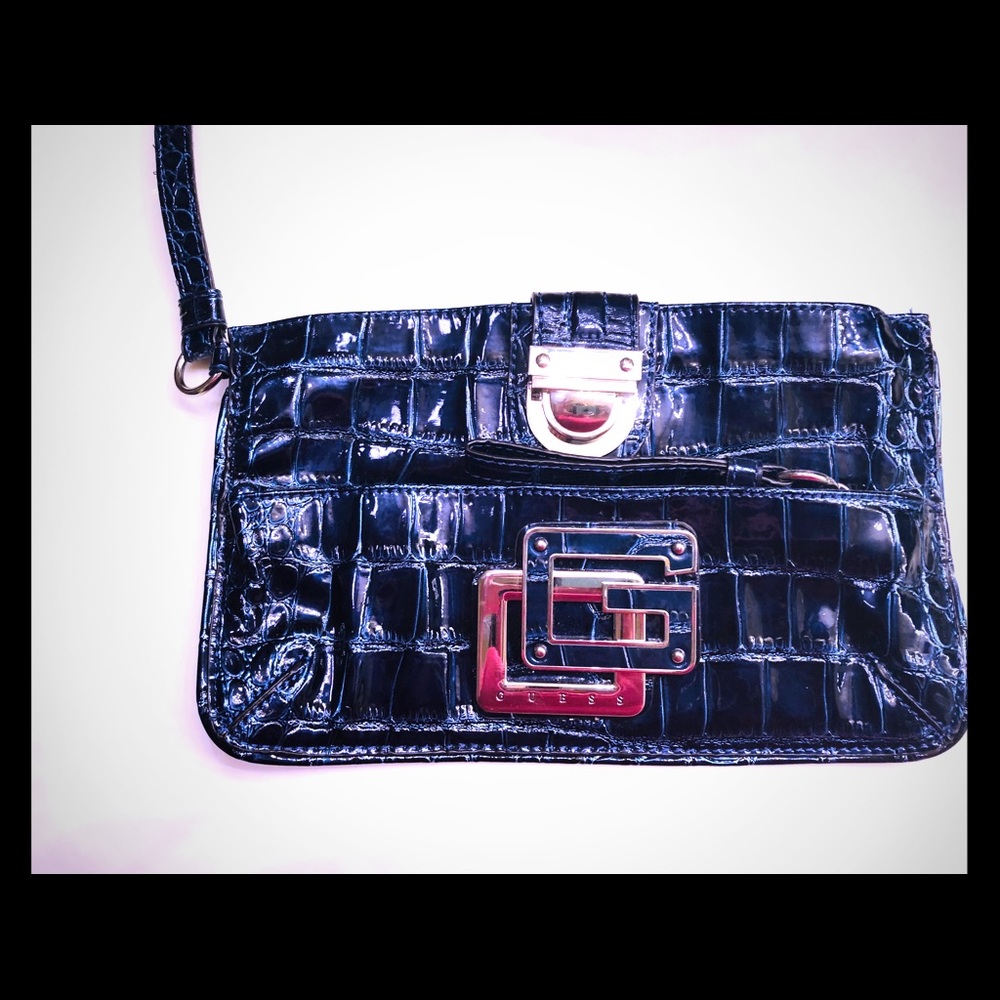 Guess clutch handbag.